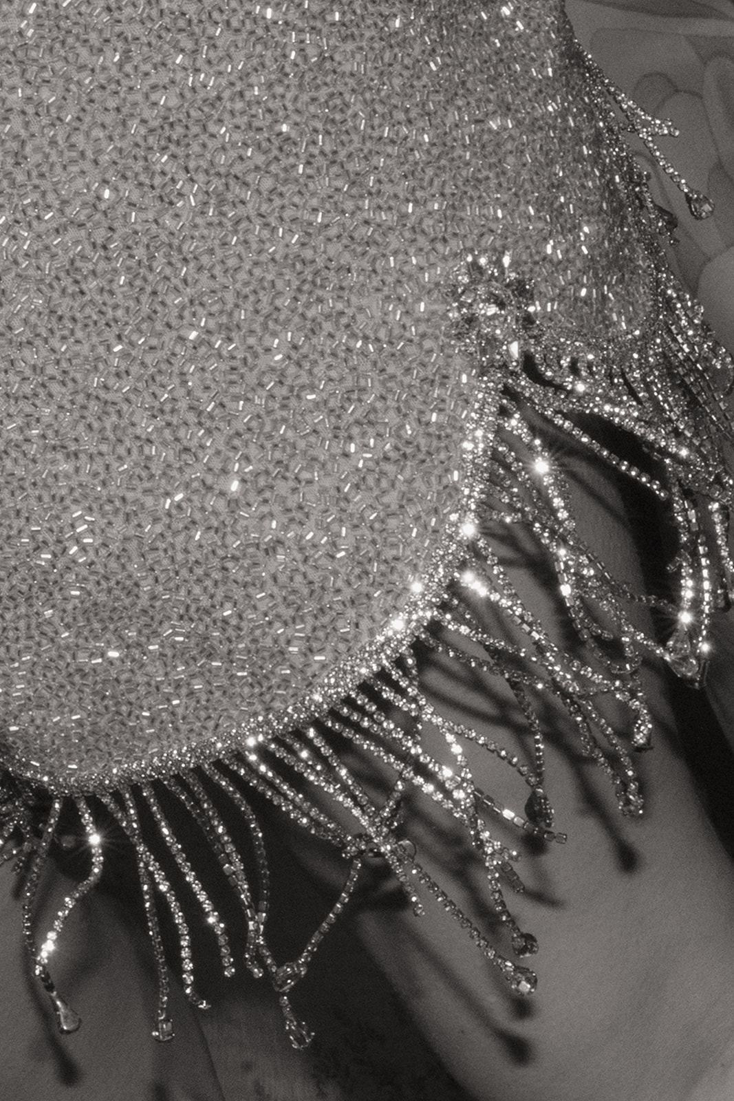 Close-up of beaded fringe sparkling on a party dress